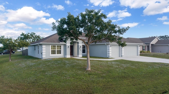 single story home with a garage and a front lawn