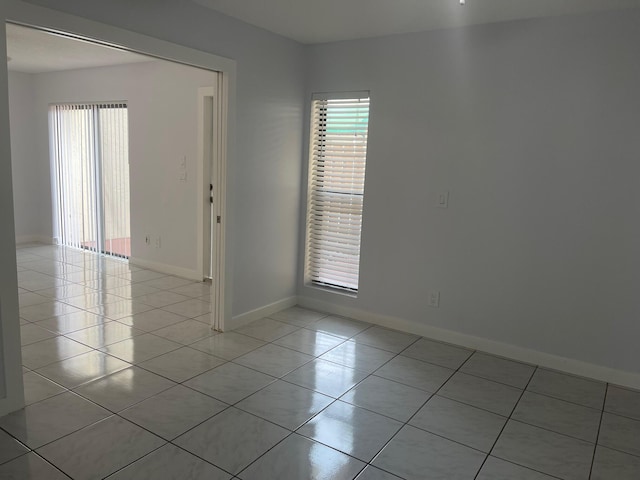 view of tiled spare room