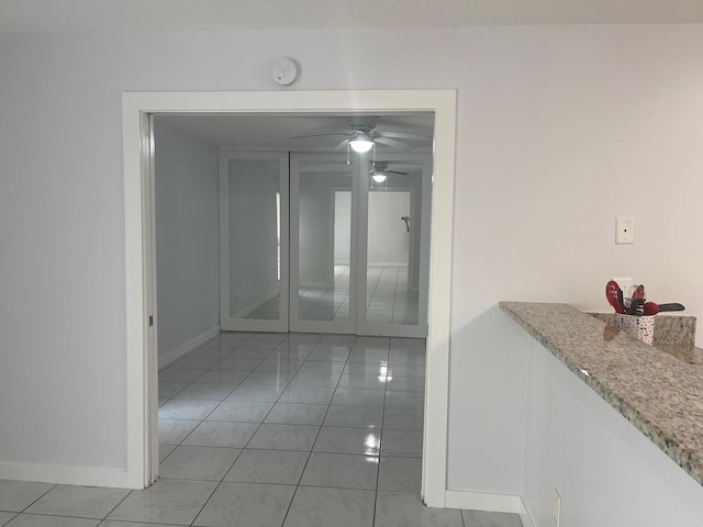 interior space with light tile patterned floors