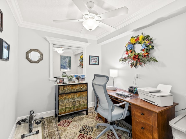 office with a textured ceiling, ceiling fan, and crown molding