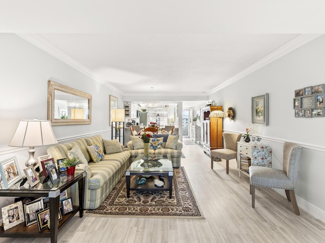 living room featuring hardwood / wood-style floors and crown molding