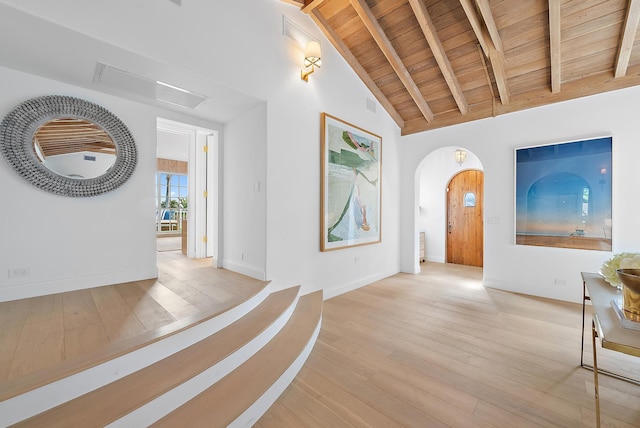 hallway featuring beamed ceiling, wooden ceiling, high vaulted ceiling, and light hardwood / wood-style flooring