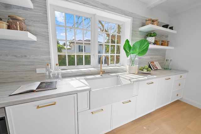 interior space featuring white cabinetry and a wealth of natural light