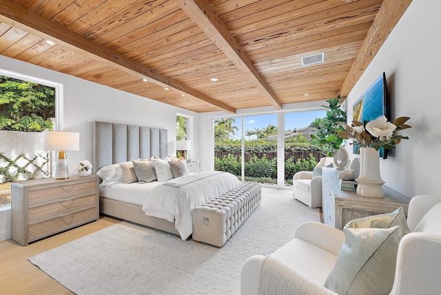 bedroom with beam ceiling, wooden ceiling, light hardwood / wood-style floors, and access to outside