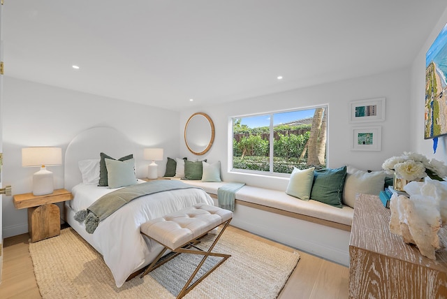 bedroom with light hardwood / wood-style flooring