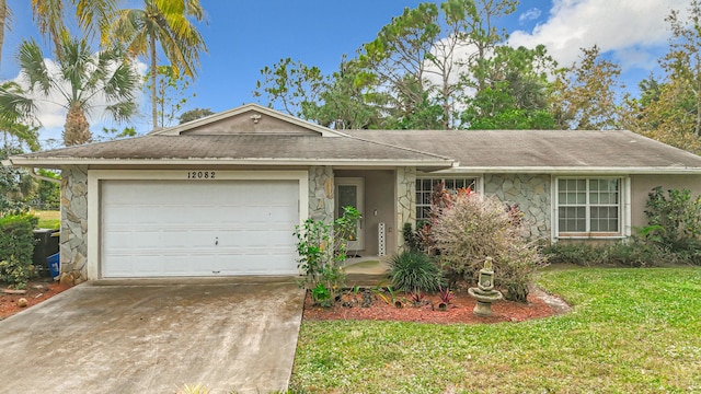 ranch-style home featuring a front lawn and a garage