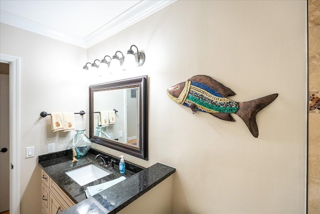 bathroom featuring vanity and crown molding