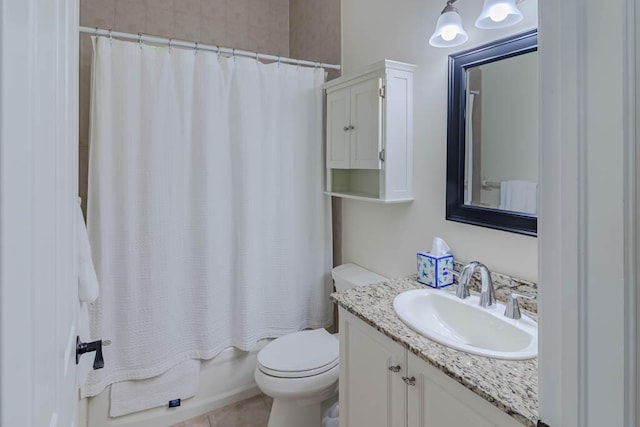 bathroom with vanity, toilet, tile patterned flooring, and shower / tub combo with curtain