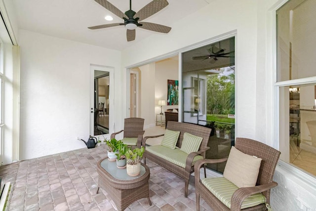 view of patio / terrace featuring ceiling fan