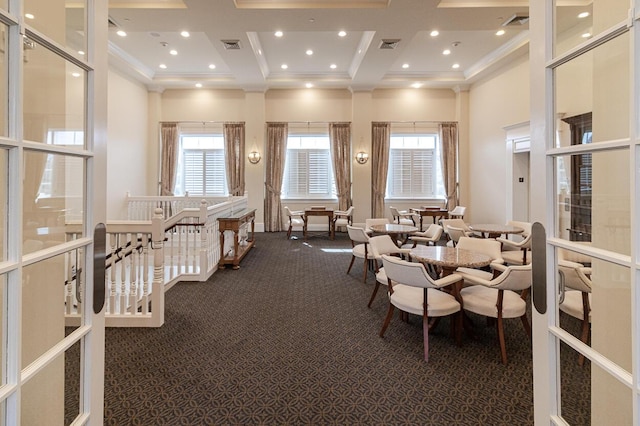 miscellaneous room featuring crown molding, dark colored carpet, recessed lighting, a towering ceiling, and coffered ceiling