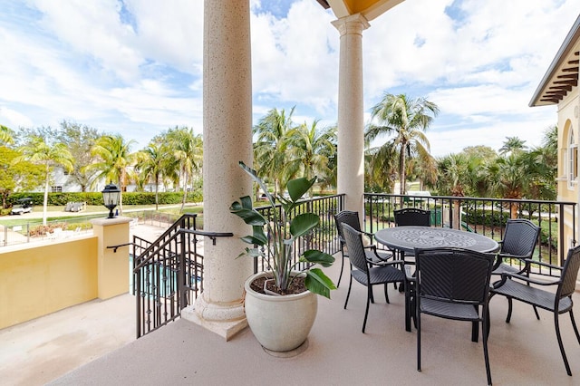 balcony featuring outdoor dining area