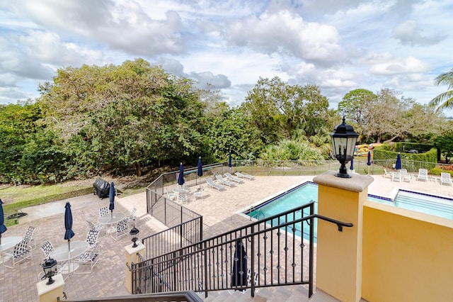 exterior space featuring fence and a patio area