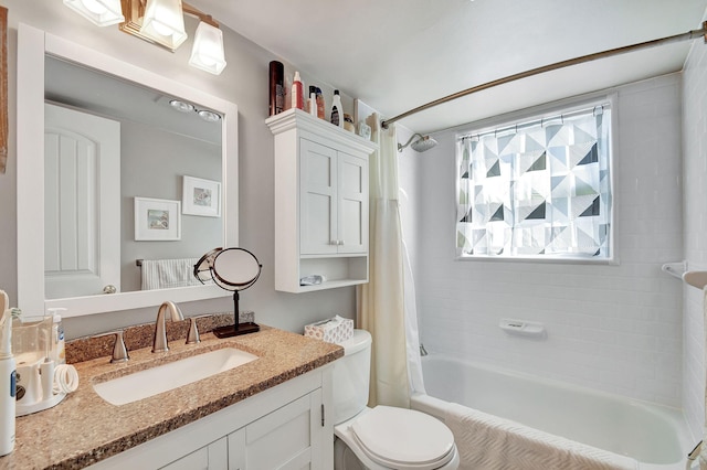 full bathroom with vanity, a healthy amount of sunlight, toilet, and shower / bath combo with shower curtain