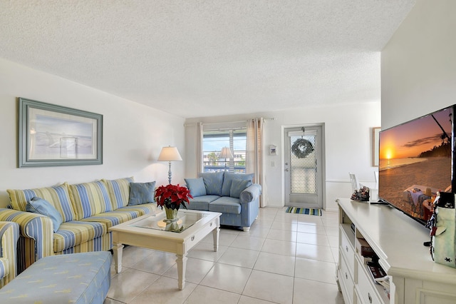 tiled living room with a textured ceiling