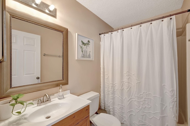 bathroom with vanity, a shower with shower curtain, a textured ceiling, and toilet