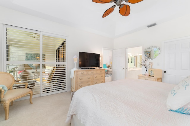 bedroom featuring ensuite bath, ceiling fan, and light carpet