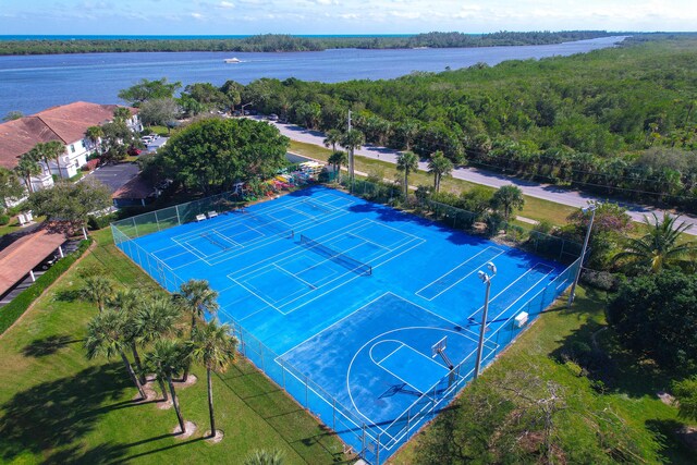 birds eye view of property featuring a water view