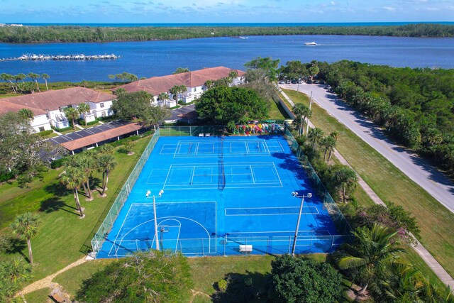 birds eye view of property featuring a water view