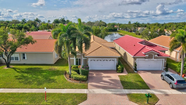 bird's eye view with a water view