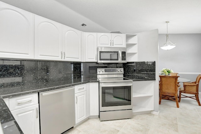 kitchen with white cabinetry, stainless steel appliances, pendant lighting, decorative backsplash, and light tile patterned flooring