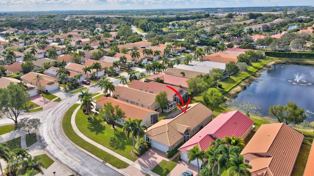 drone / aerial view featuring a water view