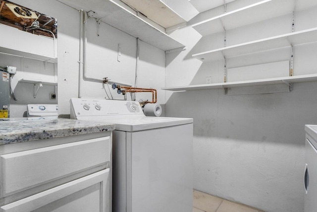 laundry room with washer / dryer