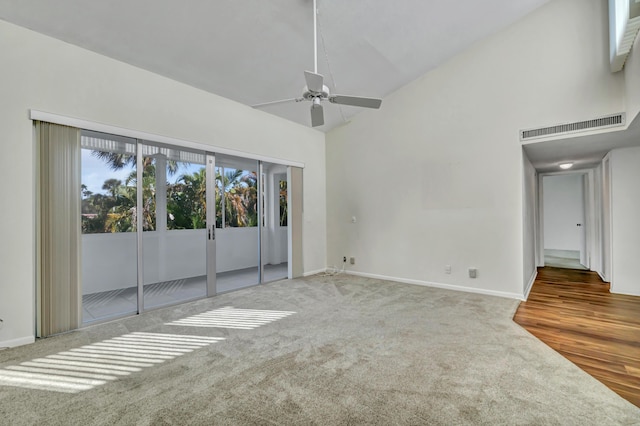 interior space featuring high vaulted ceiling and ceiling fan