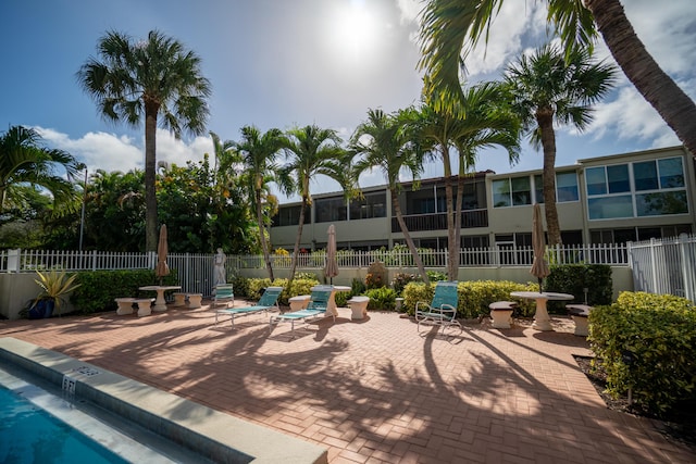 view of pool featuring a patio