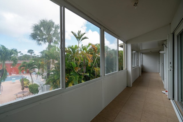 unfurnished sunroom featuring a healthy amount of sunlight