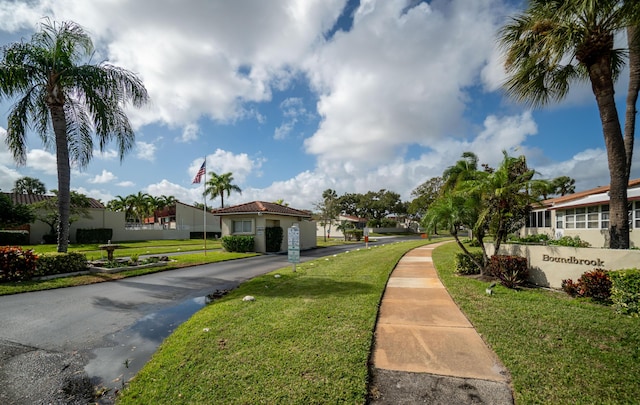 view of community with a yard