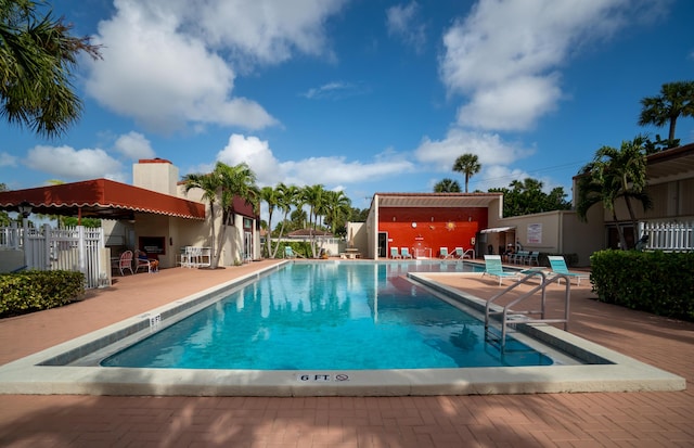 view of pool featuring a patio area