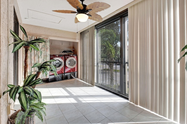 interior space with a ceiling fan, floor to ceiling windows, and light tile patterned floors