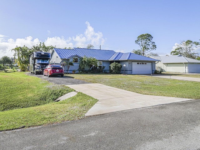 view of front facade with a front lawn and a garage