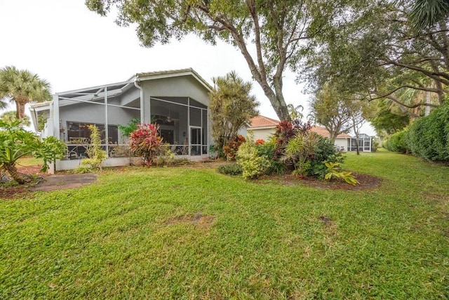 view of yard featuring a lanai