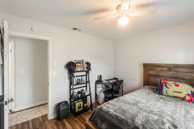 bedroom featuring dark hardwood / wood-style floors and ceiling fan