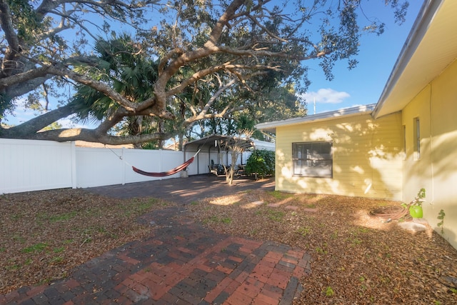 view of yard with a carport