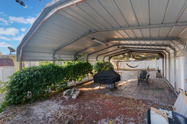 view of parking / parking lot with a carport