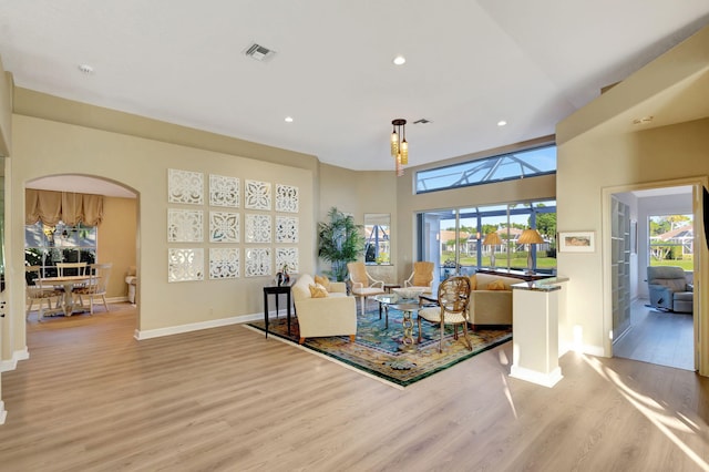 living room with light hardwood / wood-style floors