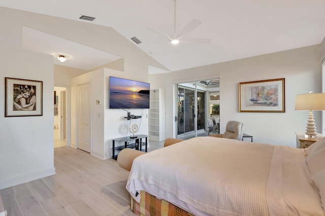 bedroom with ceiling fan, access to exterior, vaulted ceiling, light hardwood / wood-style floors, and a closet