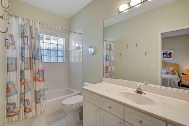 full bathroom featuring toilet, vanity, shower / bath combo, and tile patterned flooring