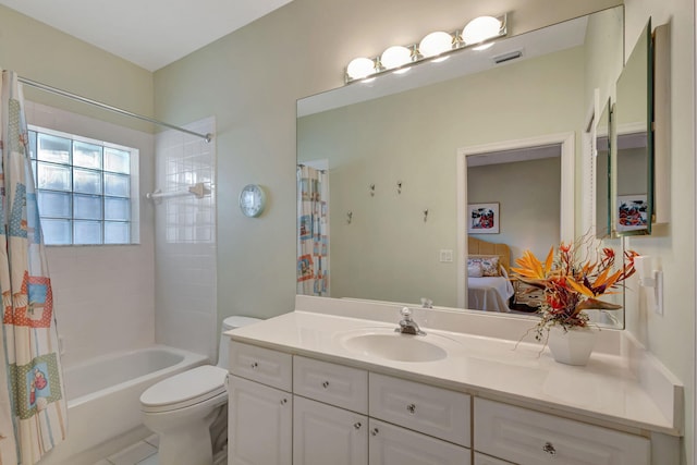 full bathroom with toilet, vanity, and shower / bath combo