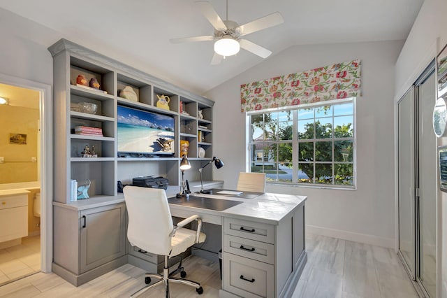 office space with ceiling fan and lofted ceiling