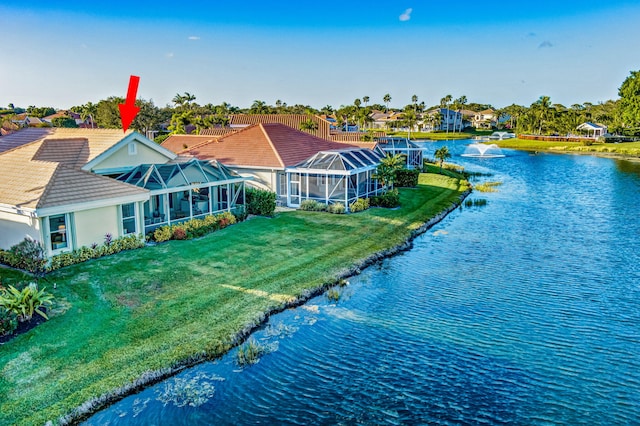 drone / aerial view with a water view