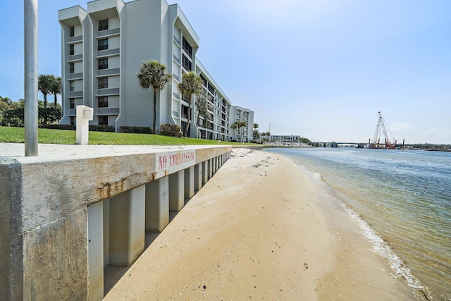 view of water feature with a beach view