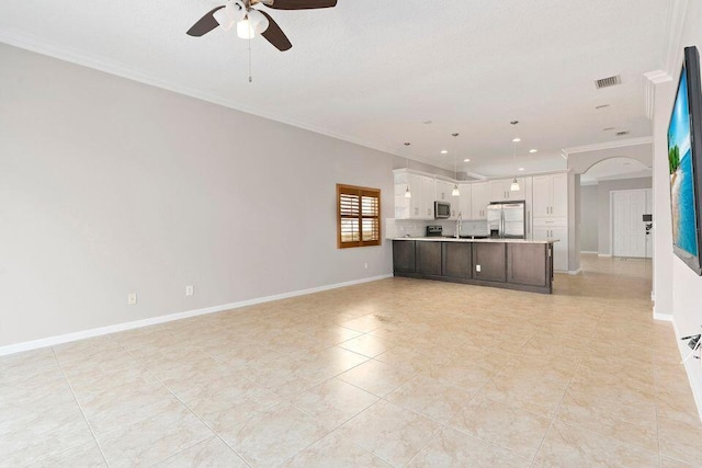 unfurnished living room with crown molding, sink, ceiling fan, and light tile patterned floors