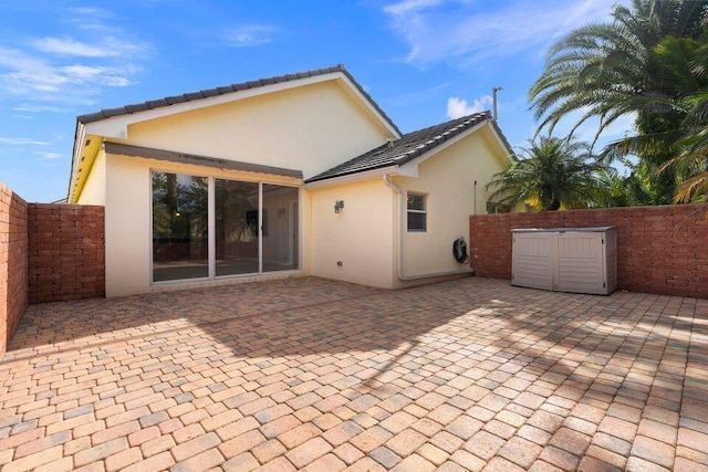 rear view of house with a patio area