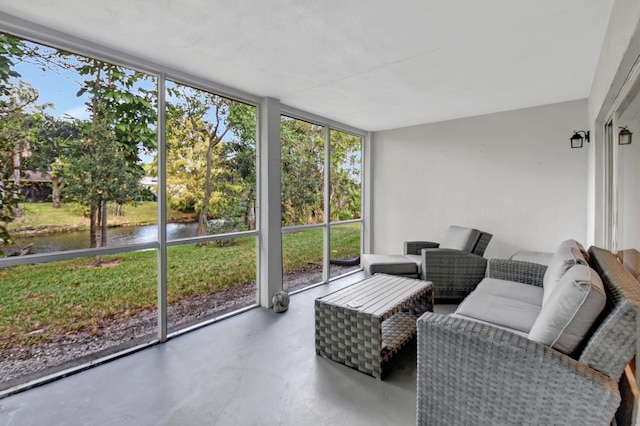 sunroom with a water view