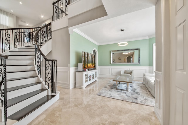 interior space with crown molding