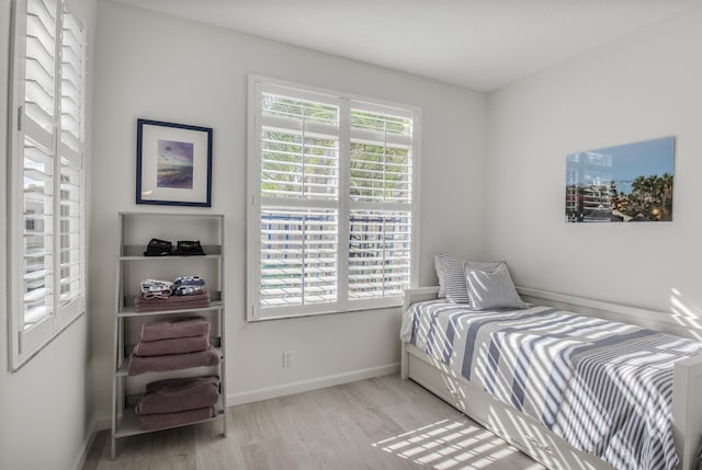 bedroom featuring light wood-type flooring