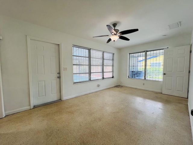 foyer with ceiling fan